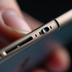 jak działa przycisk migawki w iPhone 16
